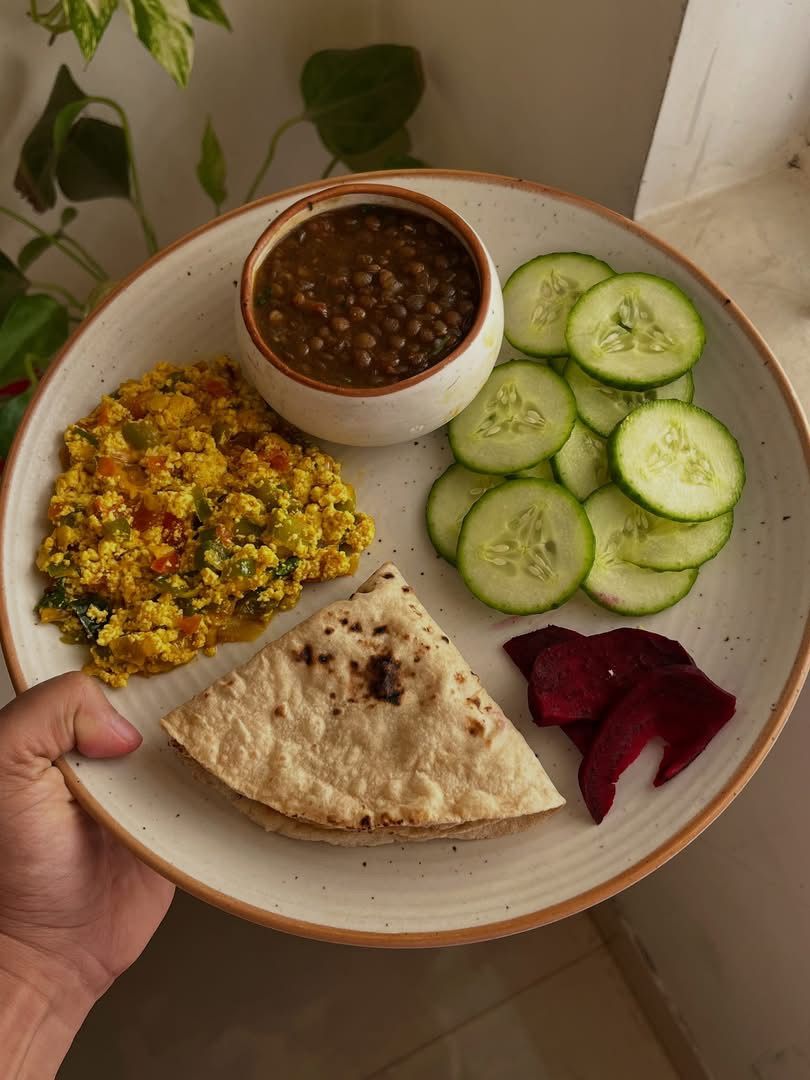 Balanced Desi Diet Plate with lentils, healthy protein, cucumber salad and roti